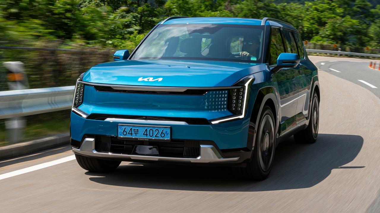 The Kia EV9 has plenty of punch on the road., Digital mirrors feature in the EV9 GT-Line., Kia’s EV9 is the only large electric seven-seater on sale., The EV9 has a well-appointed cabin., The Kia EV9 GT-Line will be the brand’s first $100,000-plus car., The Kia EV9 represents new territory for Kia., Technology, Motoring, Motoring News, Kia EV9 sizes up BMW’s X5
