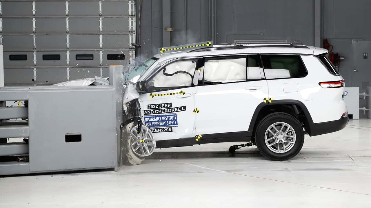 A 2023 Jeep Grand Cherokee crashing into a barrier for testing purposes.