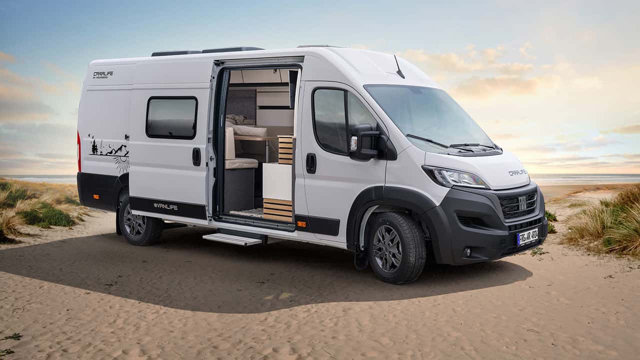 fiat camper van by weinsberg packs l-shaped kitchen, shower in small package