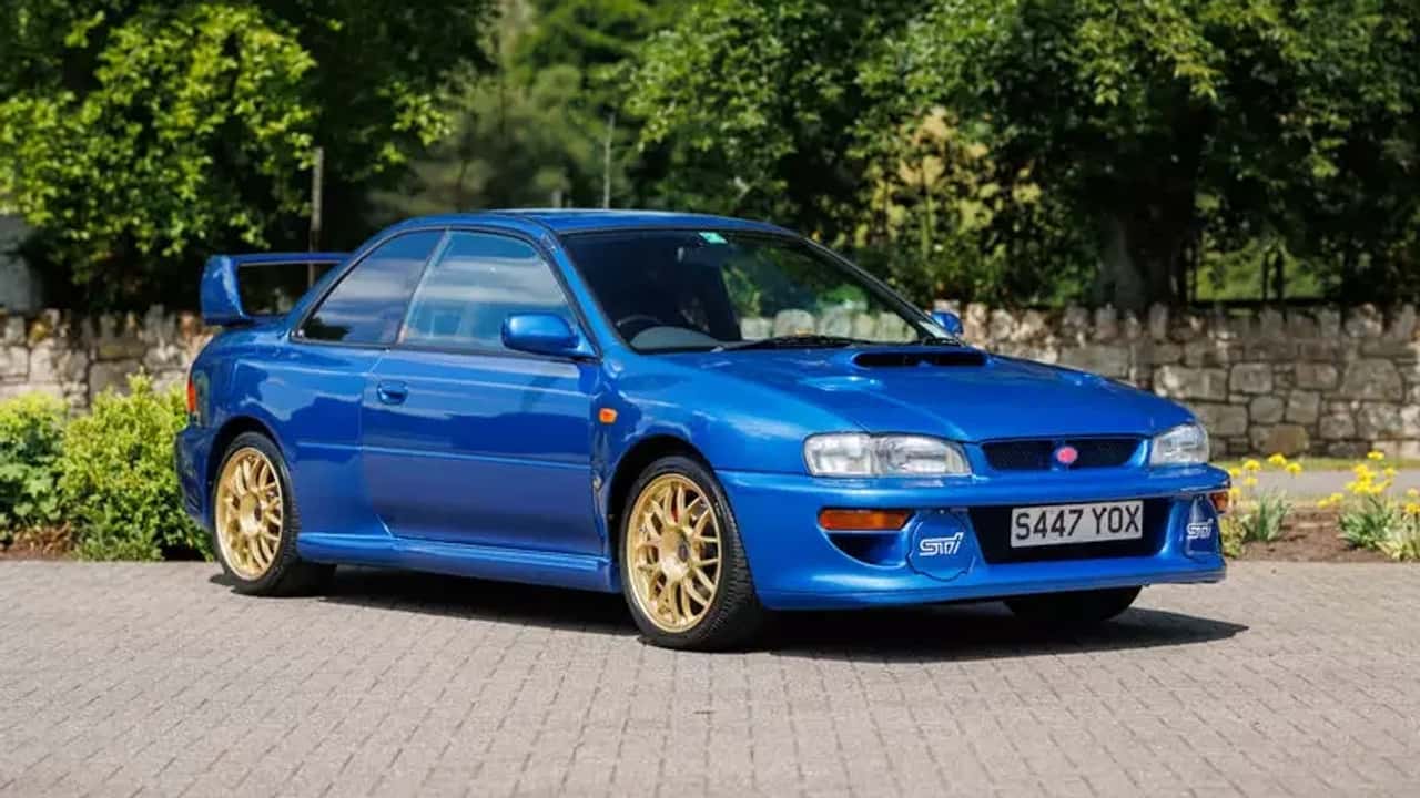 subaru impreza 22b owned by colin mcrae fetches $606k at auction