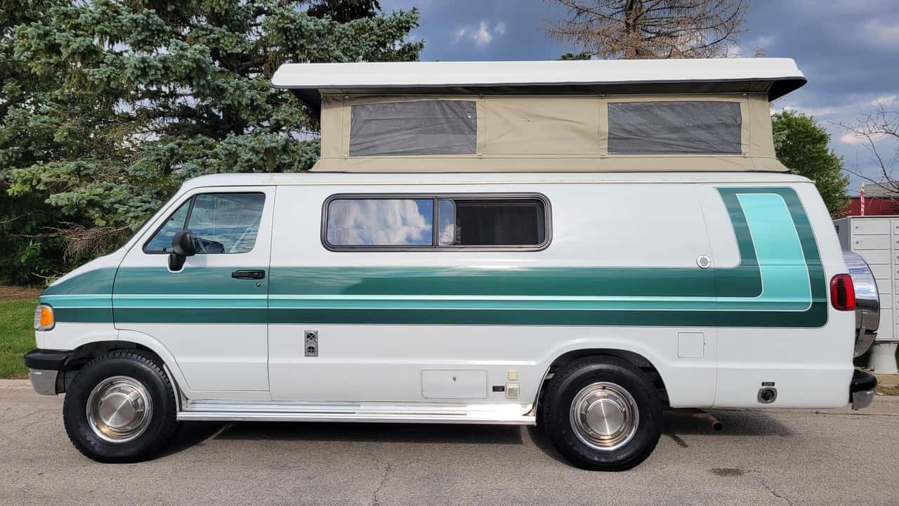 1996 dodge pop-top camper van on cars & bids is a clean, green machine