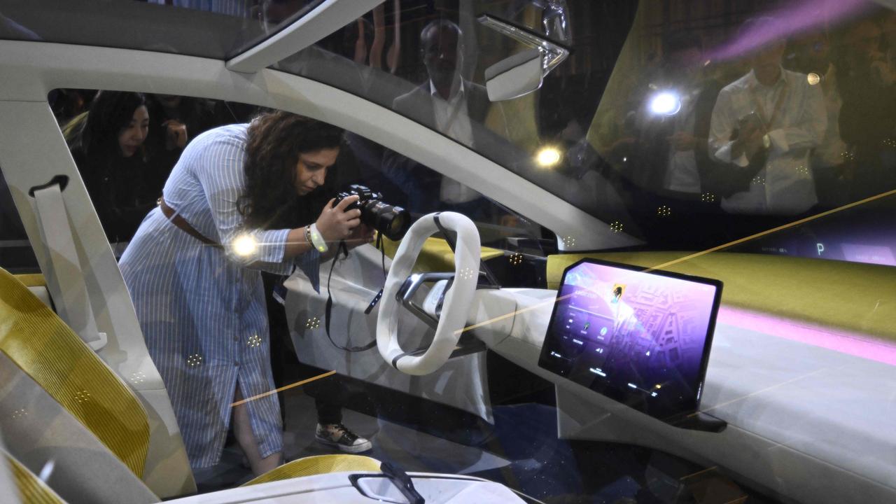 Visitors take pictures of the 'Neue Klasse' (New Class) in Munich. Photo: Tobias SCHWARZ / AFP, 2023 Mercedes-Benz Concept CLA class., A study of the 'Neue Klasse' (New Class) project, the new electric vehicle concepts, is seen during a preview event in Munich on September 2, 2023, on the eve of the opening of the Munich Motor Show (IAA) on September 4, 2023. Photo: Tobias SCHWARZ / AFP, Visitors watch the premiere presentation of the Mercedes Benz Concept CLA Class during the International Motor Show IAA in Munich. Photo: Christof STACHE / AFP, The Mercedes Benz Concept CLA Class combines crisp looks with plenty of range. Photo: Christof STACHE / AFP, BMW chief executive Oliver Zipse presents the 'Neue Klasse' (New Class) project on the eve of the opening of the Munich Motor Show. Photo: Tobias SCHWARZ / AFP, Mercedes presented the Concept CLA Class during the International Motor Show IAA in Munich. Photo: Christof STACHE / AFP, Technology, Motoring, Motoring News, Automotive giants prepare for war
