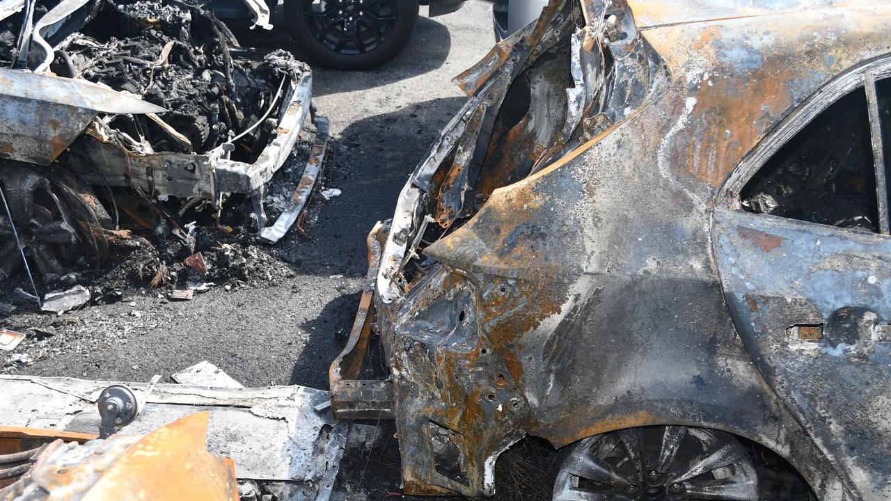 Firefighters managed to get on top of the fire quickly. Picture; Supplied., A number of cars were destroyed after an EV battery caught fire near Sydney Airport. Picture: Supplied., Technology, Motoring, Motoring News, Battery fire destroys five cars at Sydney Airport
