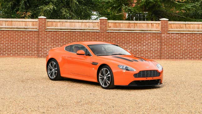 for almost $500k, these orange aston martins can be your whole personality