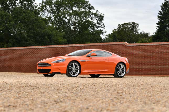 for almost $500k, these orange aston martins can be your whole personality