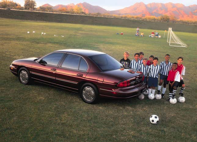 If you try to fit all these little boys in a Chevy Lumina they will die. Also, you shouldn’t drive on a soccer field. Rookie mistake.