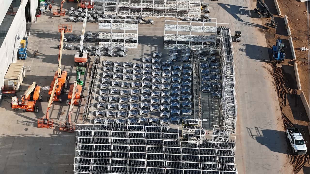 tesla cybertruck front and rear castings piling up at giga texas