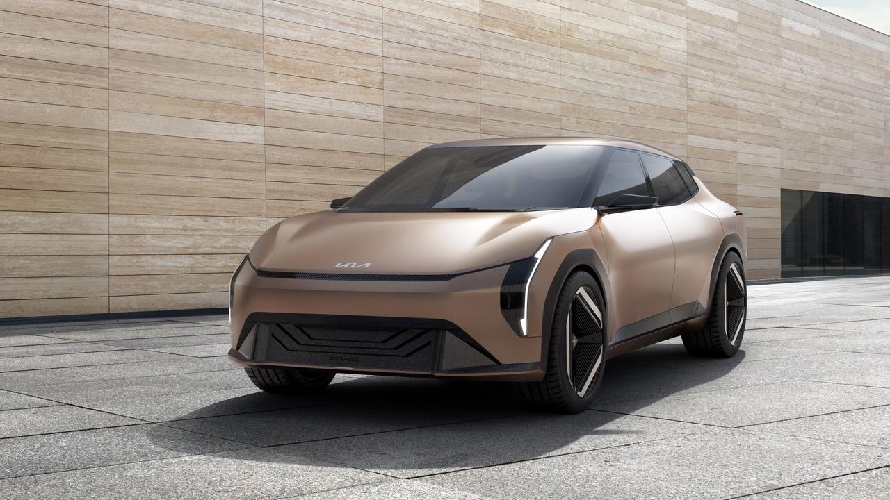 The new EV4 looks likely to head into production., Kia says sustainable materials are central to its EVs., Kia’s EV3 concept points to a fun-sized EV., The new EV5 is a smaller cousin to the EV9., The Kia EV4 sedan is a concept car … for now., Kia has confirmed the EV5 electric vehicle for production., Technology, Motoring, Motoring News, Kia goes all-in on EVs with new EV5