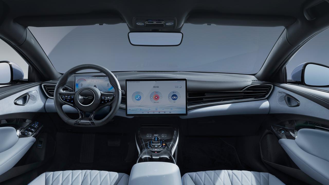 The Seal’s central touchscreen rotates to display content in portrait or landscape form., The Seal shapes up as an alternative to the Tesla Model 3., The BYD Seal electric car is surprisingly affordable., Technology, Motoring, BYD Seal priced aggressively for Australia