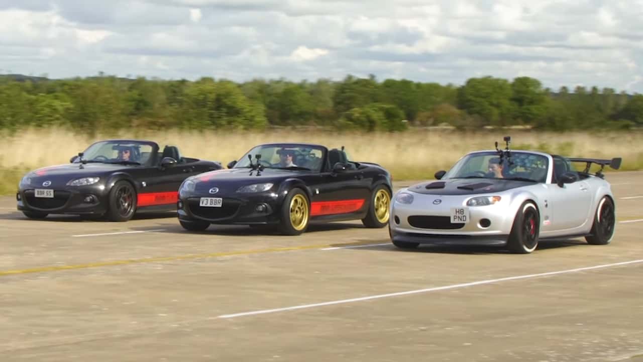 Mazda Miata drag race video. 