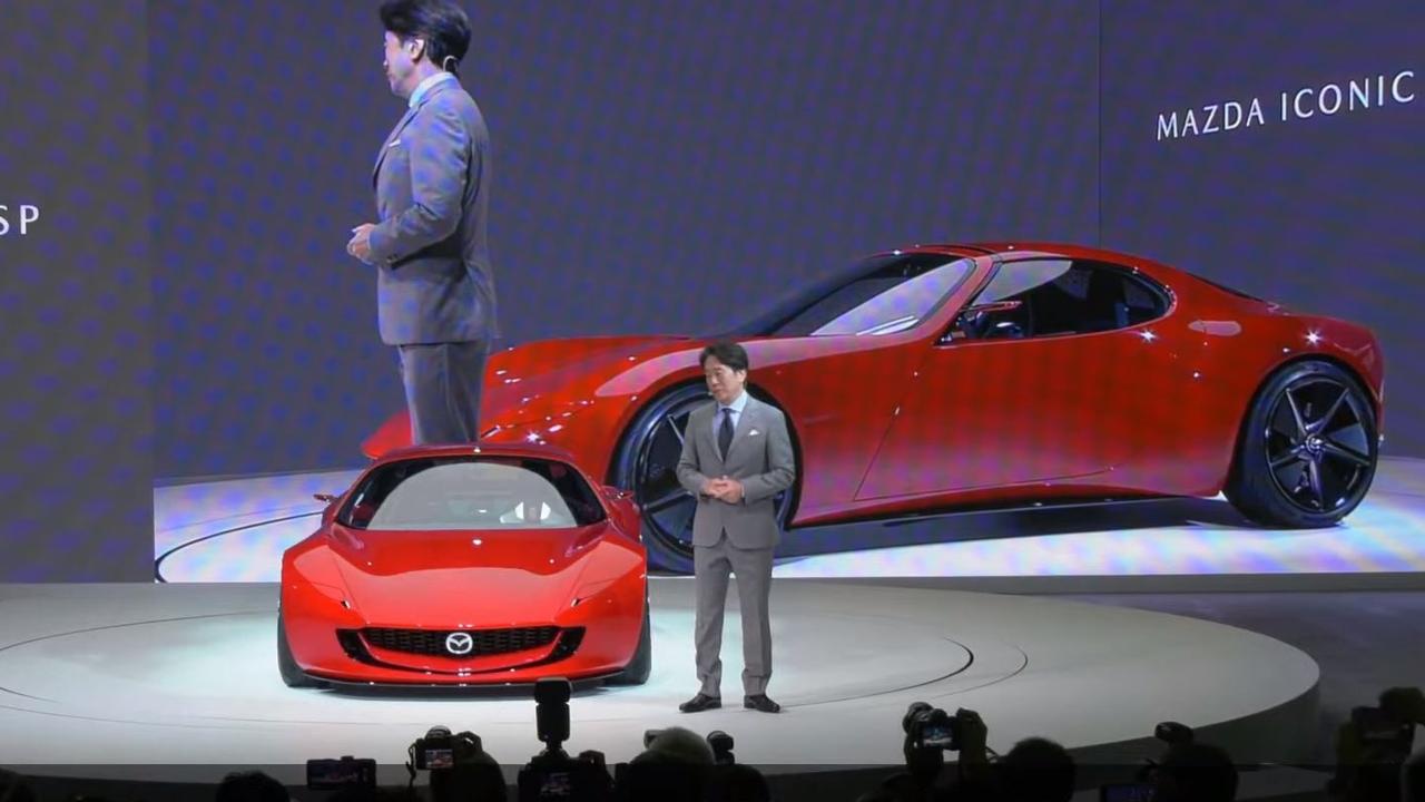 Masahiro Moro says the tiny concept is evidence of Mazda’s automotive passion., Rotary power helped Mazda win Le Mans in 1991., The retro-modern cabin has a simple look., The concept builds on the heritage of Mazda’s MX-5 and RX-7., The Mazda Iconic SP Concept Car debuted at the Tokyo motor show., Technology, Motoring, Motoring News, Next-gen Mazda MX-5 concept debut in Japan