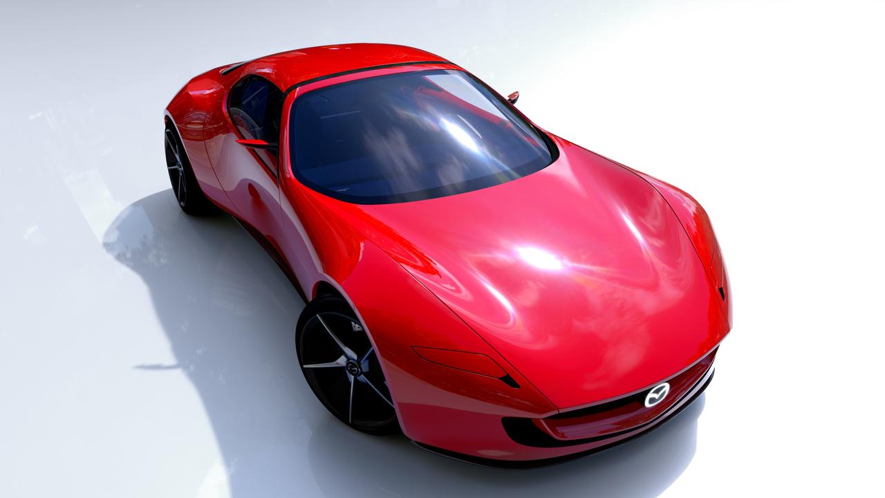 The concept has retractable headlight covers and an illuminated badge., Masahiro Moro says the tiny concept is evidence of Mazda’s automotive passion., Rotary power helped Mazda win Le Mans in 1991., The retro-modern cabin has a simple look., The concept builds on the heritage of Mazda’s MX-5 and RX-7., The Mazda Iconic SP Concept Car debuted at the Tokyo motor show., Technology, Motoring, Motoring News, Next-gen Mazda MX-5 concept debut in Japan