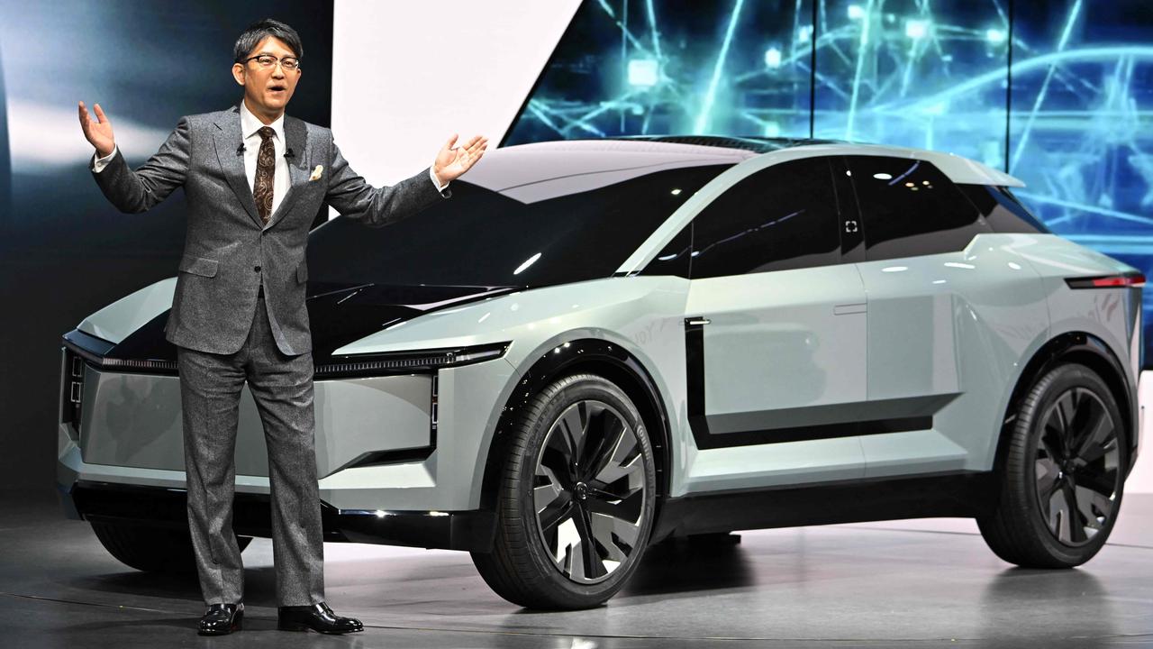 Toyota Motor President Koji Sato with the FT-3e SUV concept. Picture:: Kazuhiro NOGI/AFP, Toyota FTSe concept is similar in size to the brand’s MR2 sports car of yesteryear. Picture: Supplied., The wild new Toyota FTSe concept from the 2023 Japan Mobility Show. Picture: Supplied., Technology, Motoring, Motoring News, Toyota, Lexus unveil Tokyo motor show concepts