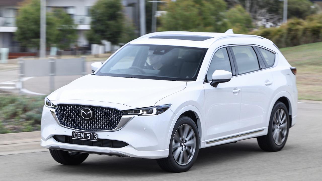 Mazda has sold close to 25,000 CX-8s to date., Mazda is attempting to move upmarket with a range of new SUVs such as the CX-90., Mazda Australia is also axing the MX-30 SUV., Australian-bound production of the CX-8 will end later this year., Technology, Motoring, Motoring News, Mazda axes CX-8 and MX-30 in Australia