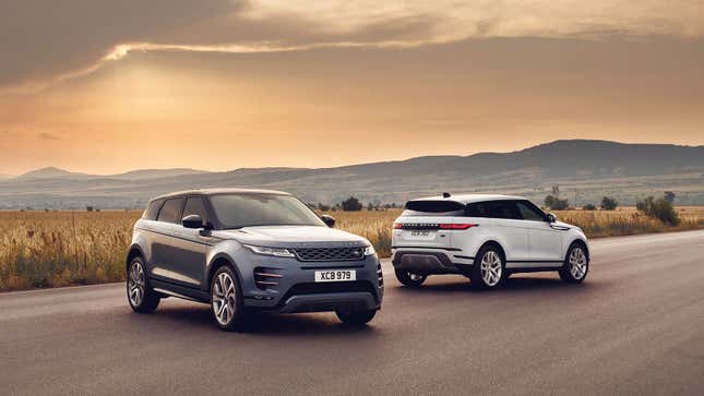 A photo of two Range Rover Evoque SUVs at sunset. 