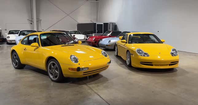 A pair of Porsche 911s -- one 993 and one 996 -- in Speed Yellow parked in a building