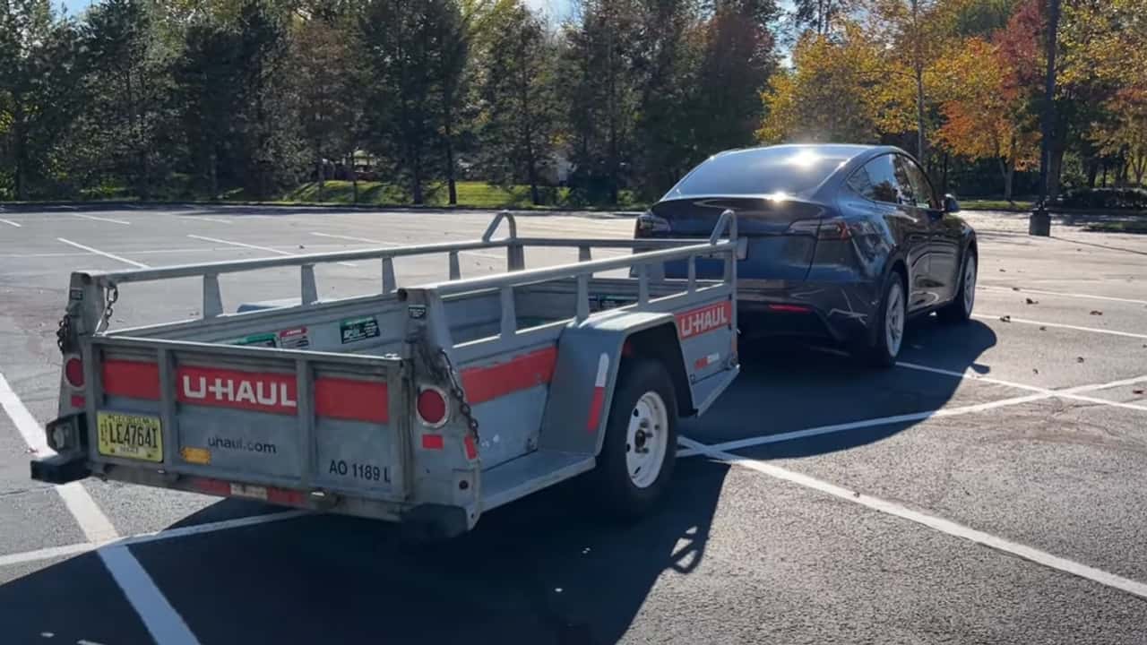 towing with your tesla model y? here's what to expect