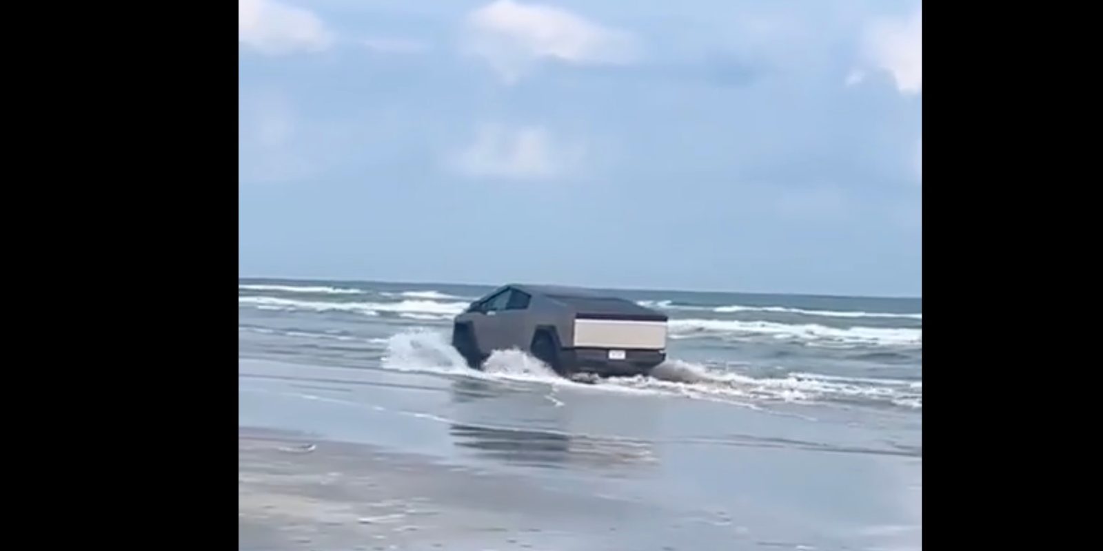 tesla spotted driving cybertruck into water after claiming it will float