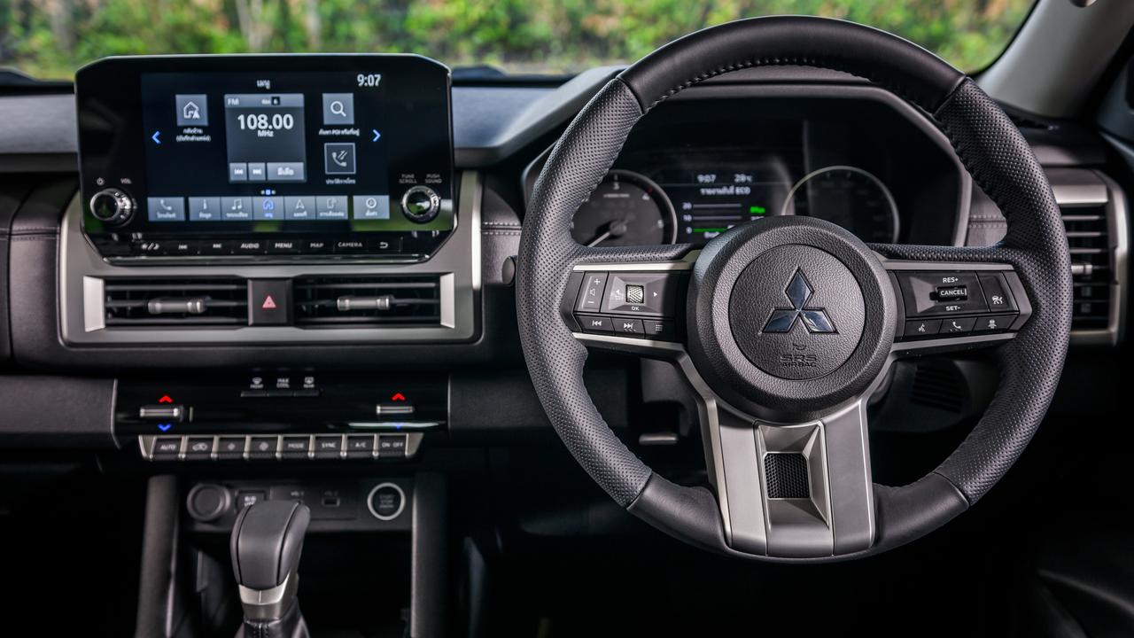 The new Triton’s cabin is much more modern than its predecessor., A more powerful engine helps it tow more than before., The Mitsubishi Triton has a bold new look., Technology, Motoring, Motoring News, Mitsubishi raises prices for new Triton
