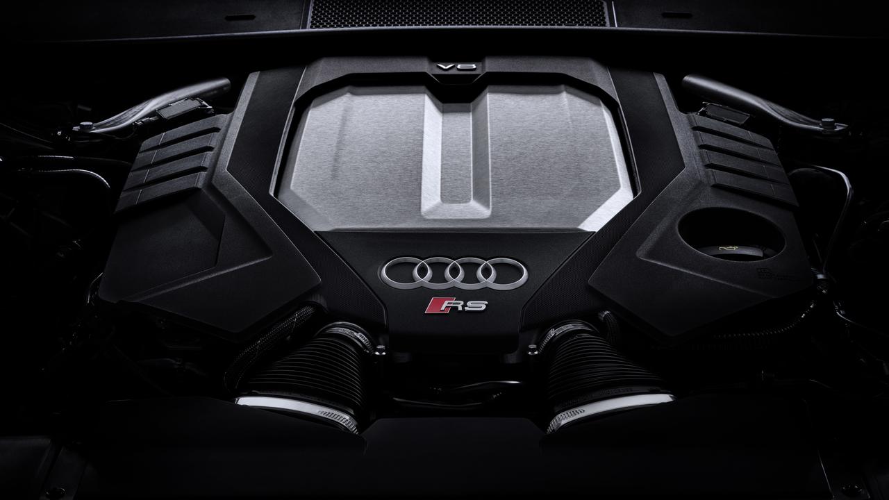 Audi’s twin-turbo V8 is a rare gem., All-wheel-drive traction helps the RS6 get its power to the ground., The Audi RS e-tron GT shares its bones with the Porsche Taycan., Audi’s RS6 shines on road and track., Technology, Motoring, Motoring News, Track test: Audi RS6 vs. Audi e-tron RS GT