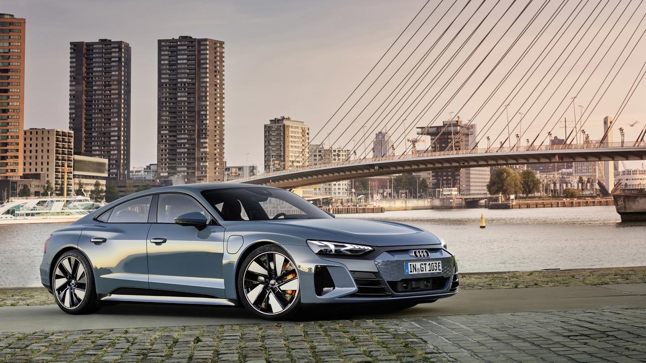 The Audi e-tron GT is an impressive machine., Audi’s RS e-tron GT looks sharp., The Audi RS e-tron GT delivers shocking acceleration., Audi’s twin-turbo V8 is a rare gem., All-wheel-drive traction helps the RS6 get its power to the ground., The Audi RS e-tron GT shares its bones with the Porsche Taycan., Audi’s RS6 shines on road and track., Technology, Motoring, Motoring News, Track test: Audi RS6 vs. Audi e-tron RS GT