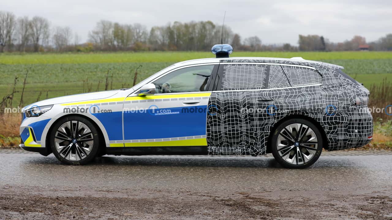 this 2024 bmw 5 series is half police car, half camouflaged wagon
