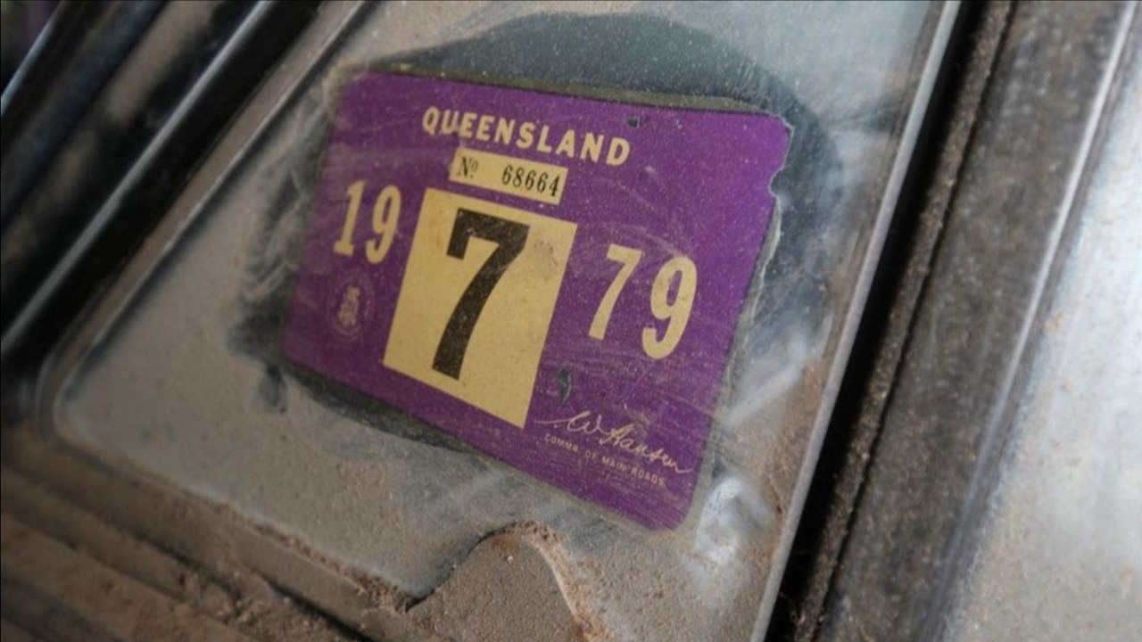 It still has its 1979 rego. Picture: Grays., Under the bonnet is the original engine. Picture: Grays., After a partial clean, it sold for $230,000. Picture: Grays., It came out covered it grime. Picture: Grays., The classic car was parked under a Queenslander for nearly 50 years. Picture: Grays., Technology, Motoring, Motoring News, ‘1-of-1’ 1970 Ford XY Falcon GT sells for staggering price